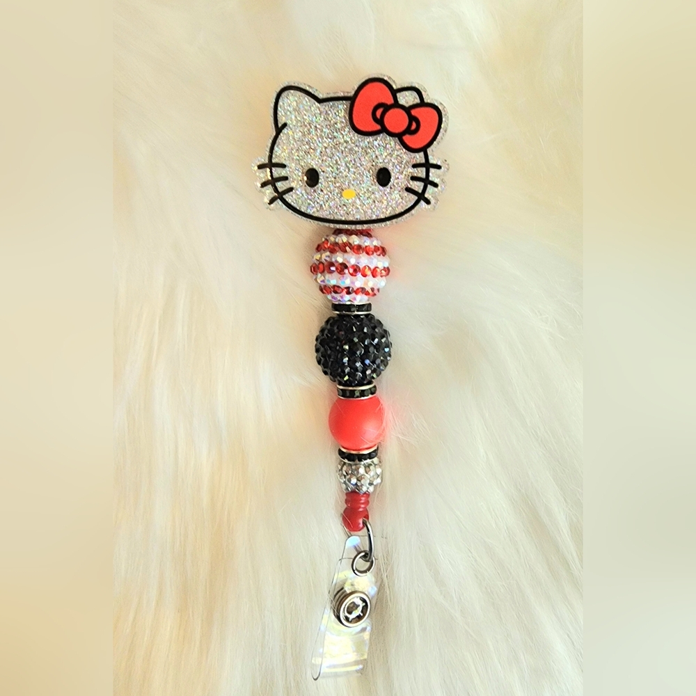 Hello Kitty Red and Black Badge Reel
